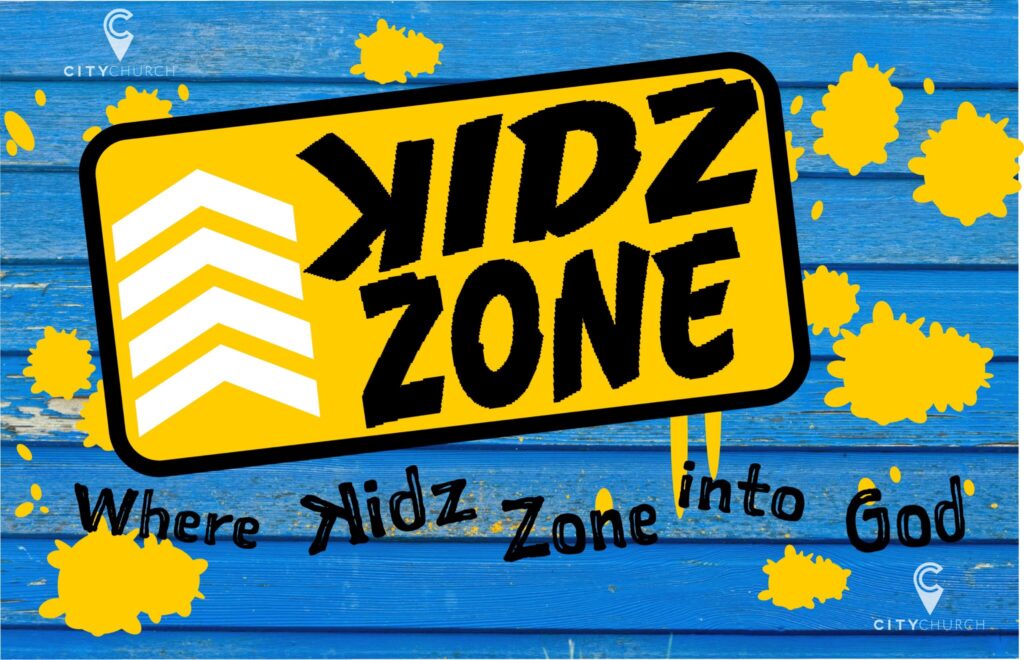 A colorful Kidz Zone sign with stars and arrows on a blue background.